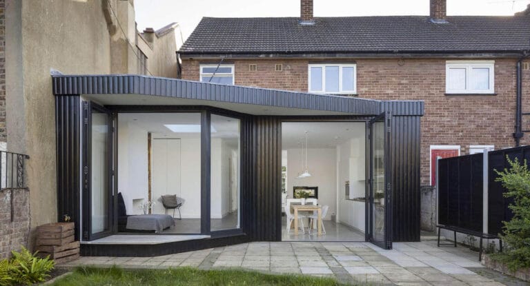 Grey ADU with large sliding glass doors