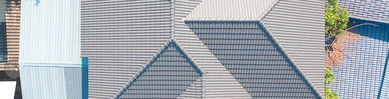 Drone view of grey roof with geometric patterns